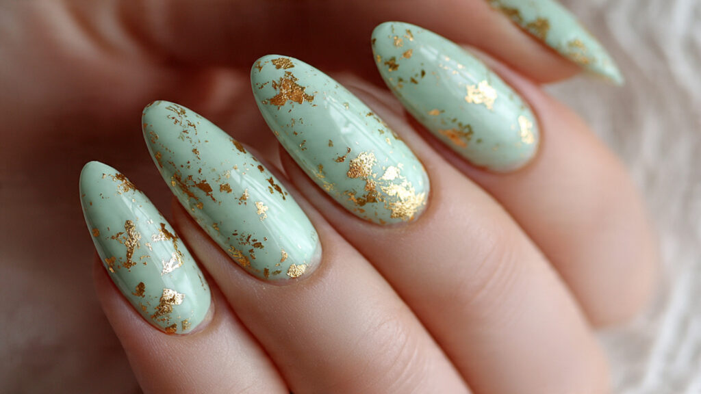 Mint green Easter nails with gold foil accents
