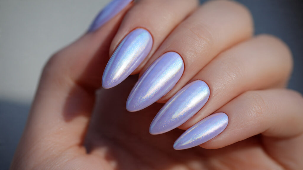 Lavender chrome March nails with glossy metallic finish.
