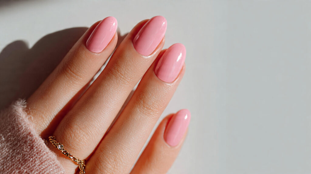 Blush pink glossy March nails for simple spring manicure.