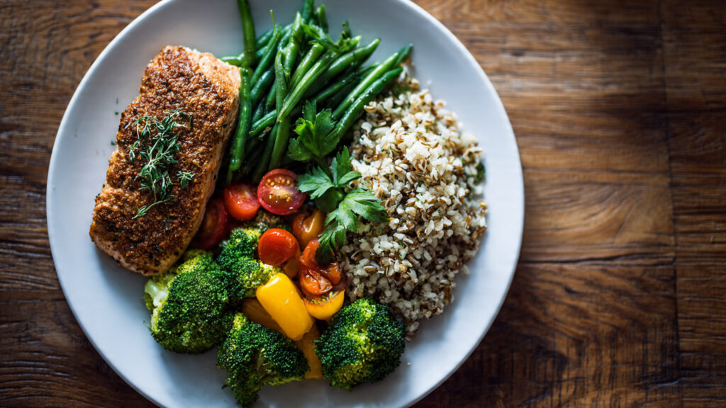 Balanced meal with protein, veggies, and grains for steady energy