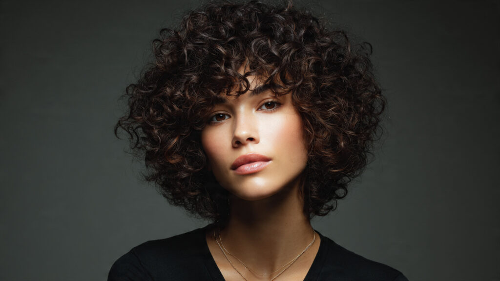 Curly bixie cut with defined natural curls