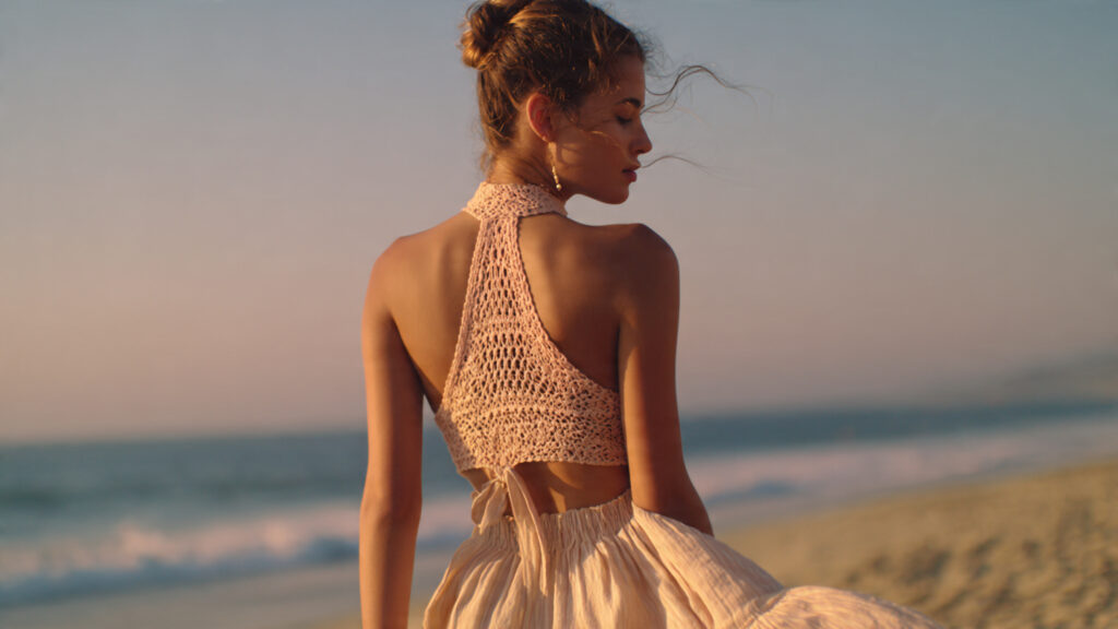 Pastel crochet halter top with open back for summer.