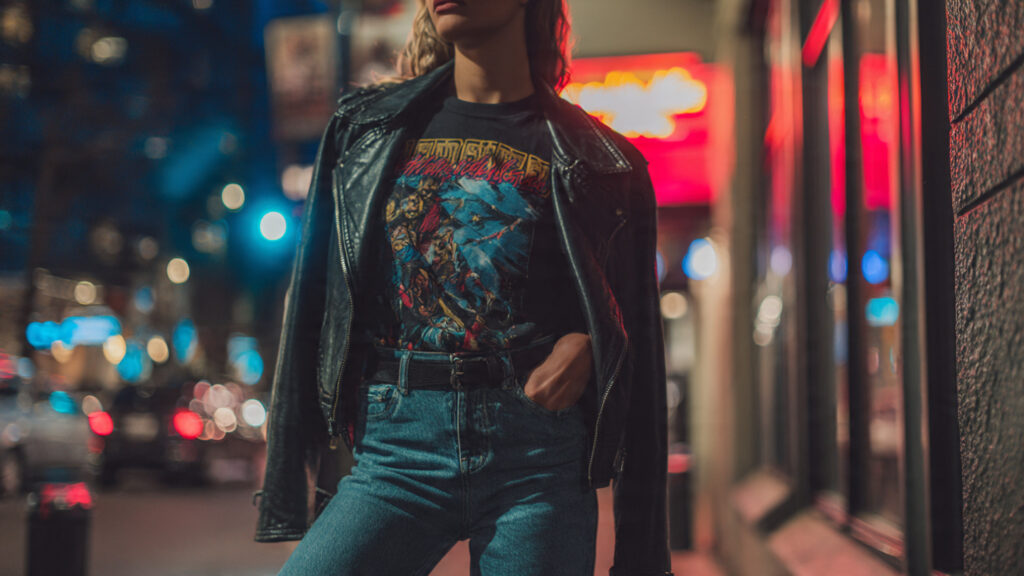 Leather jacket and graphic tee concert outfit for stylish nights.