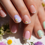 Spring-inspired March nails ideas with pastel and floral designs.